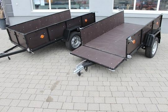 Автомобильный прицеп с откидными бортами